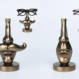 S/3X2 BROWN/GOLD RESIN GLASSES HOLDER 'FACE'