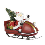 RESIN SANTA CLAUS ON RED SLEIGH WI/LED