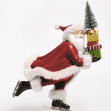RESIN SKIING SANTA CLAUS HOLDING GIFT BOXES