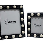 SET OF 2 ASS.PHOTO FRAME HALF BALLS BLK/WH.RESIN