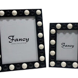 SET OF 2 ASS.PHOTO FRAME HALF BALLS BLK/WH.RESIN